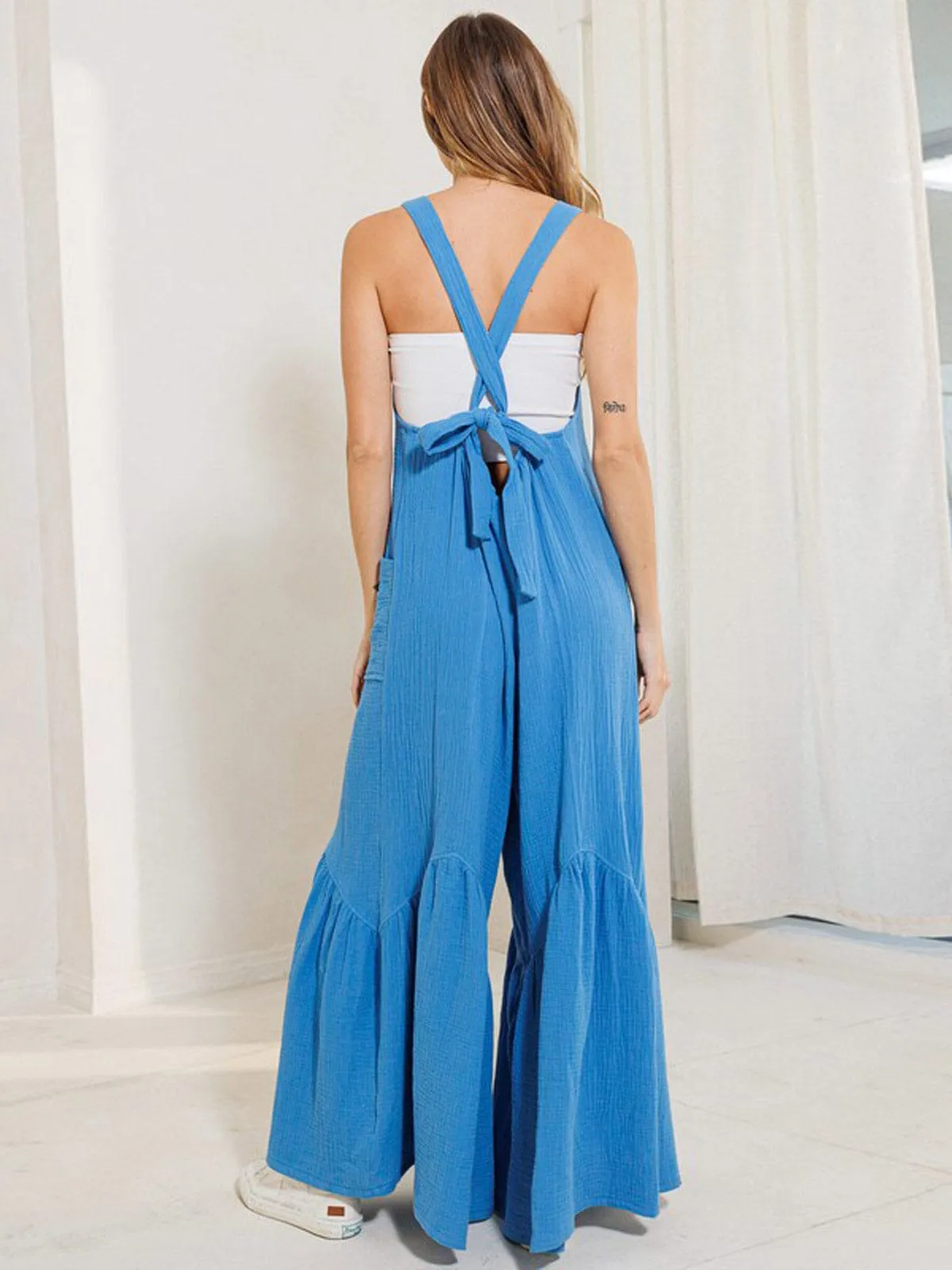 WOMEN'S SLEEVELESS OPEN BACK TIERED FRONT POCKETS WIDE LEG JUMPSUIT